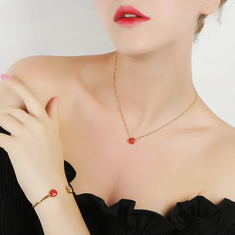 Collar con el signo del zodiaco en oro de 18 quilates