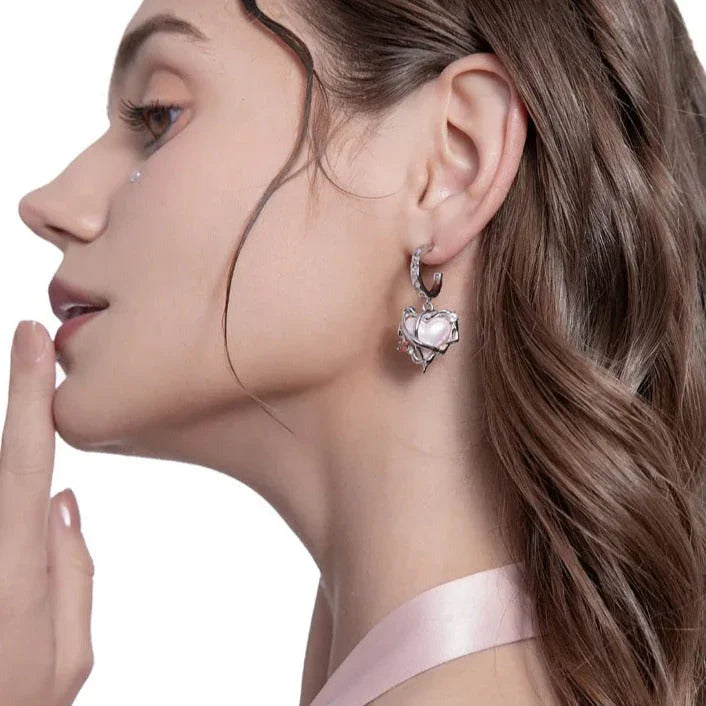 Par de pendientes de corazón de belleza