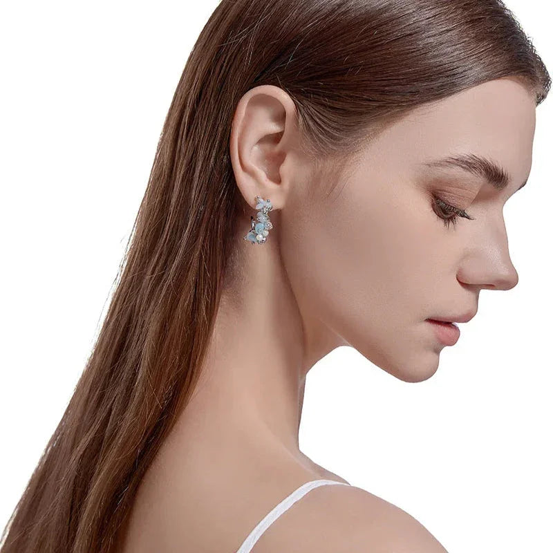 Par de pendientes florales