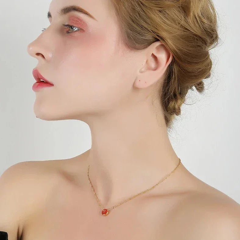 Collar con el signo del zodiaco en oro de 18 quilates