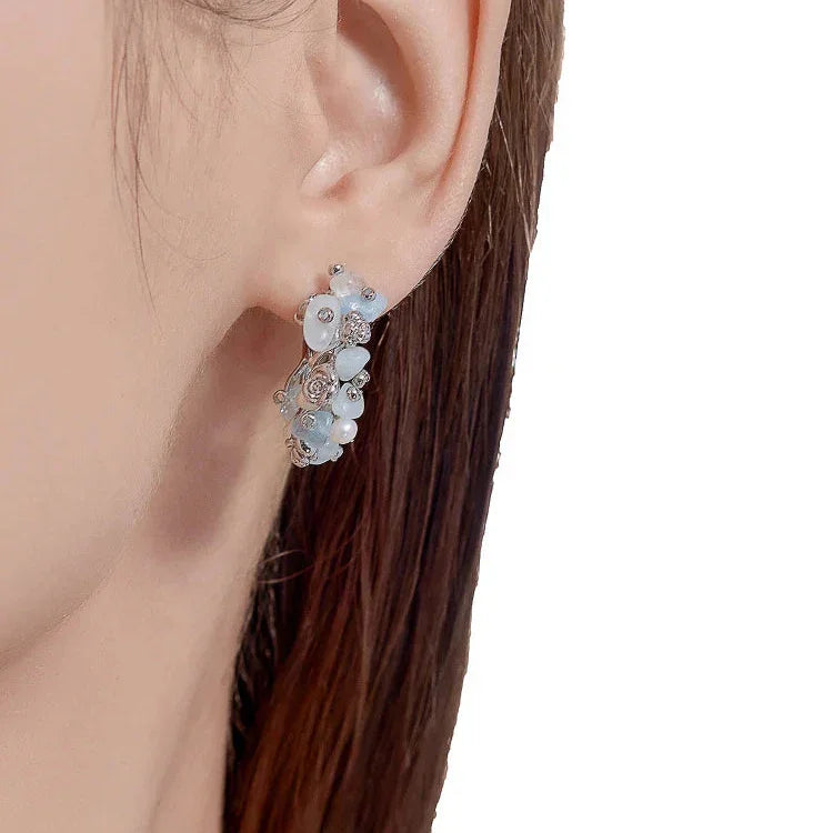 Par de pendientes florales