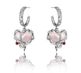 Par de pendientes de corazón de belleza