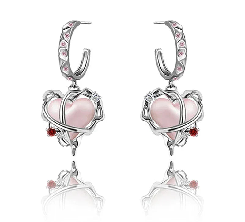 Par de pendientes de corazón de belleza