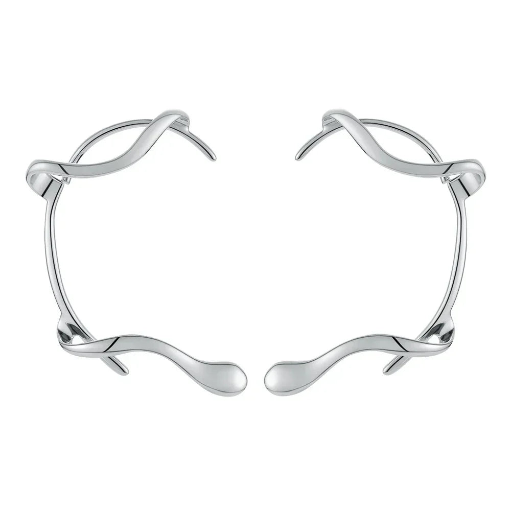 Par de pendientes brillantes con protección para las orejas