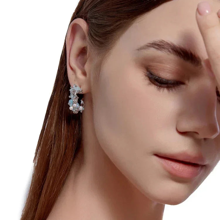 Par de pendientes florales