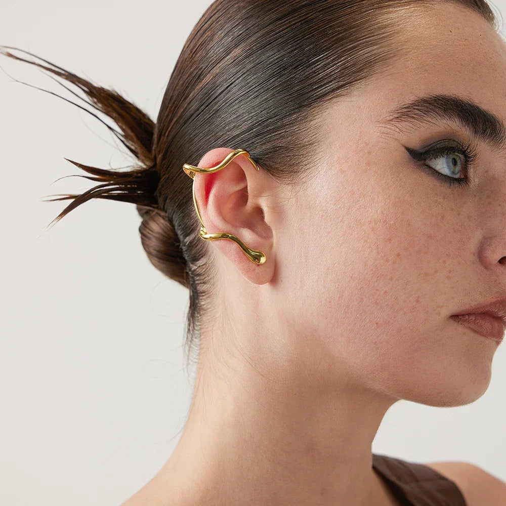 Par de pendientes brillantes con protección para las orejas