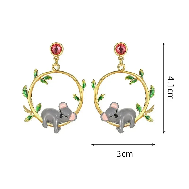 Par de aretes de koala en oro de 18 quilates