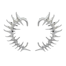 Par de pendientes punk con protección para las orejas y pinchos