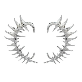 Par de pendientes punk con protección para las orejas y pinchos
