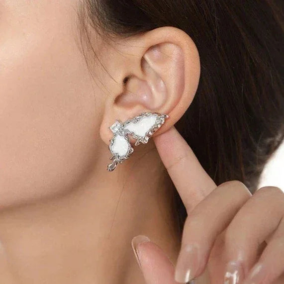 Par de pendientes de mariposa espacial
