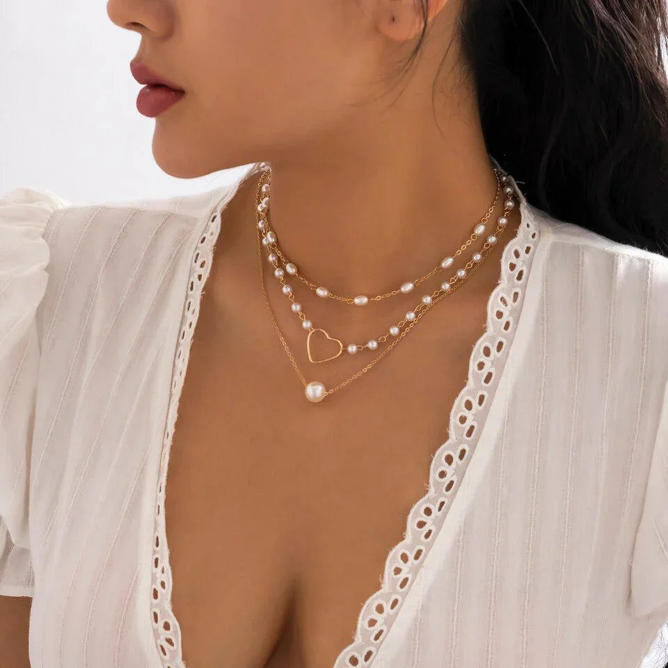 Conjunto de 3 collares de corazón con perla y oro de 18k