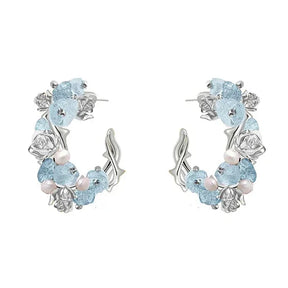 Par de pendientes florales