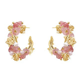 Par de pendientes florales