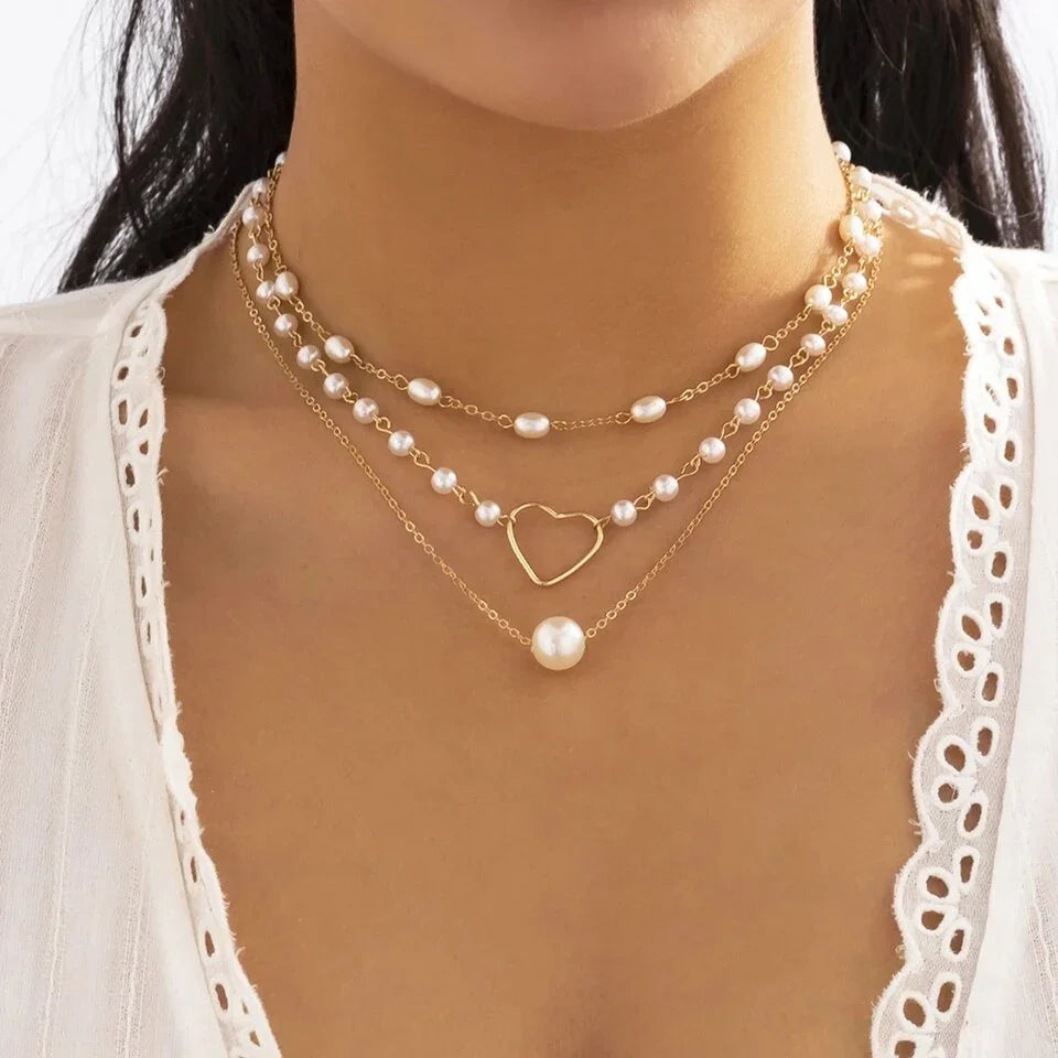 Conjunto de 3 collares de corazón con perla y oro de 18k