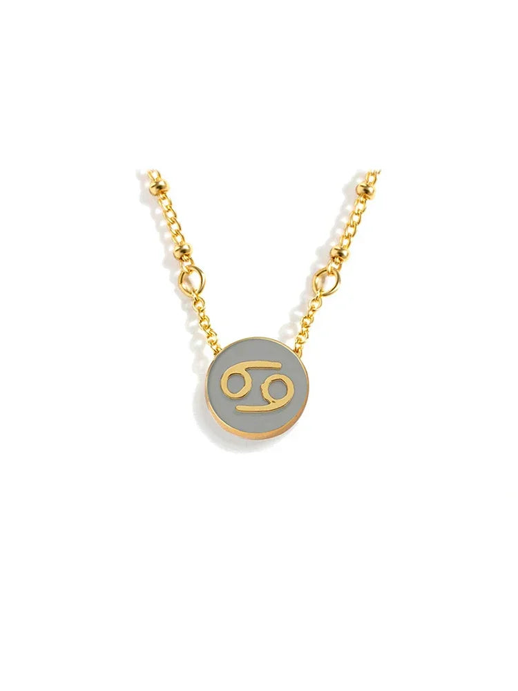 Collar con el signo del zodiaco en oro de 18 quilates