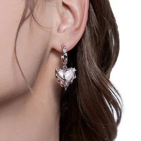 Par de pendientes de corazón de belleza