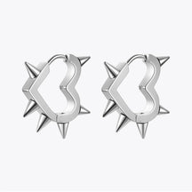 Par de pendientes de corazón punk en acero inoxidable