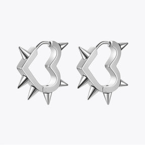 Par de pendientes de corazón punk en acero inoxidable