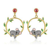 Par de aretes de koala en oro de 18 quilates