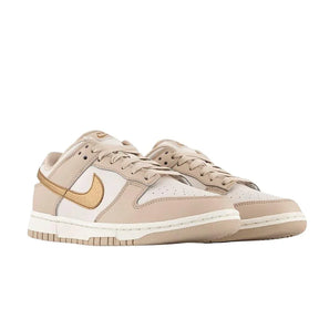 SB Dunk Low color piel y dorado