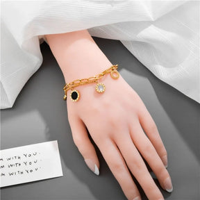 Pulsera de dijes en plata u oro