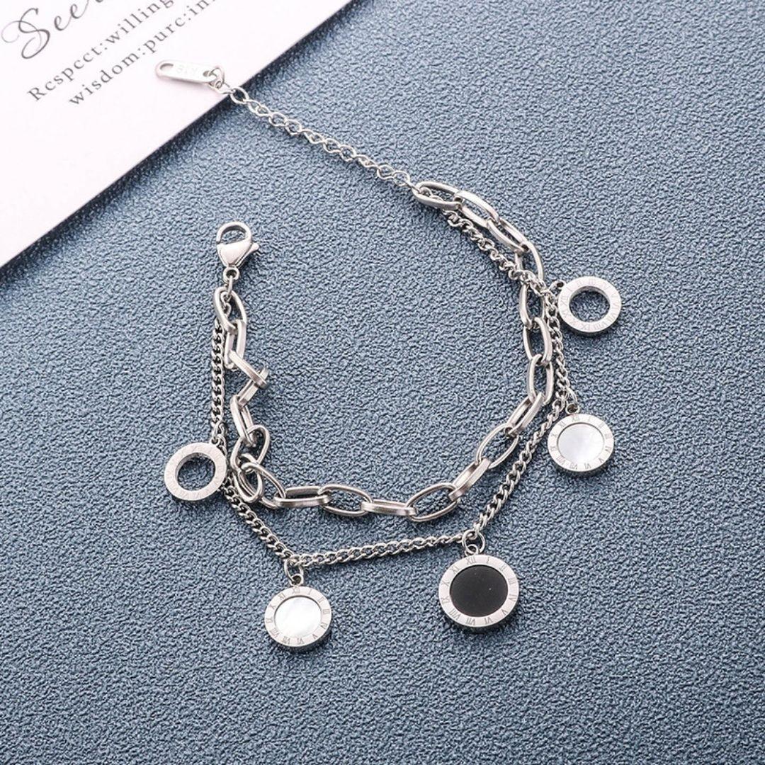Pulsera de dijes en plata u oro