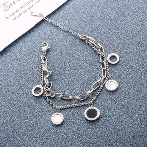 Pulsera de dijes en plata u oro