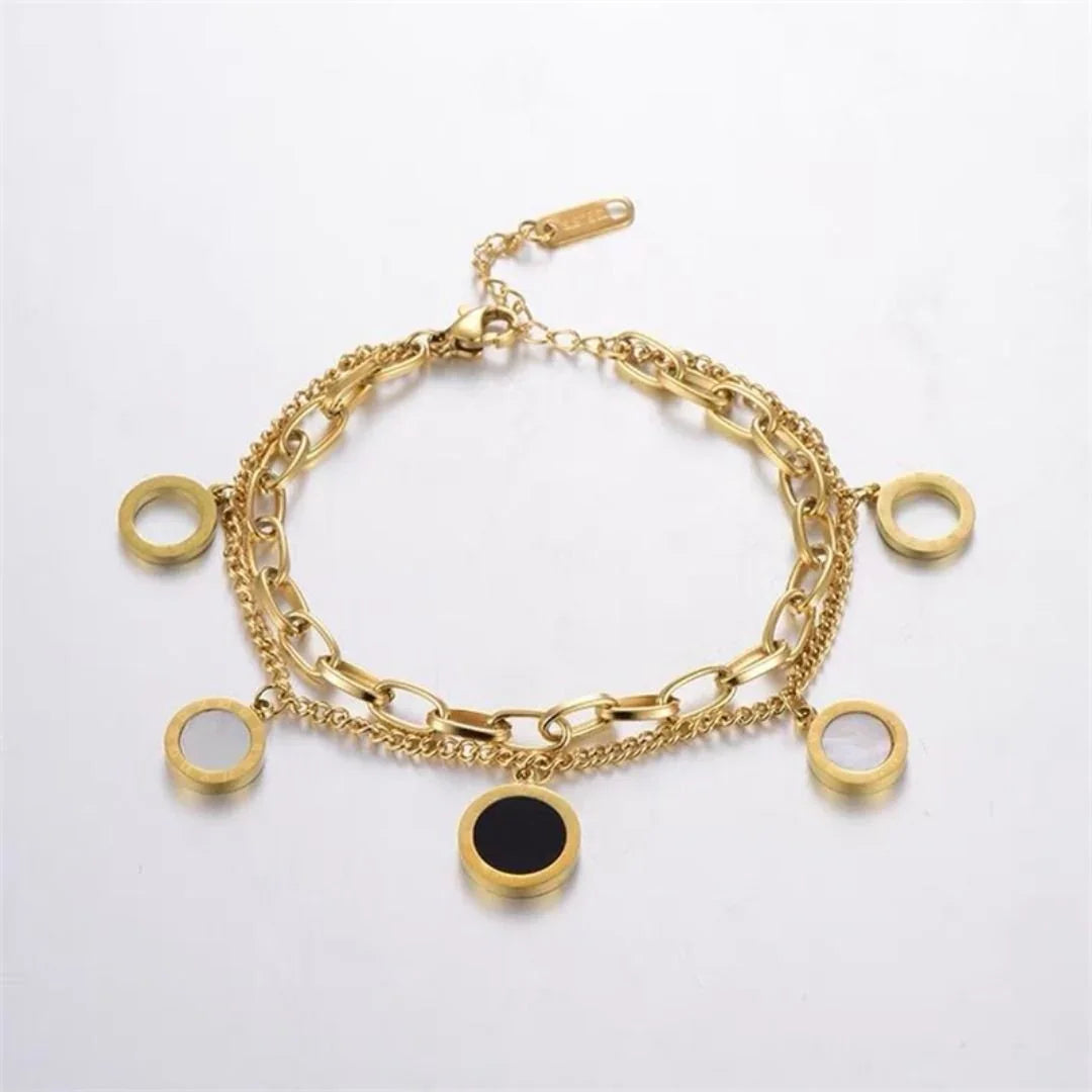 Pulsera de dijes en plata u oro